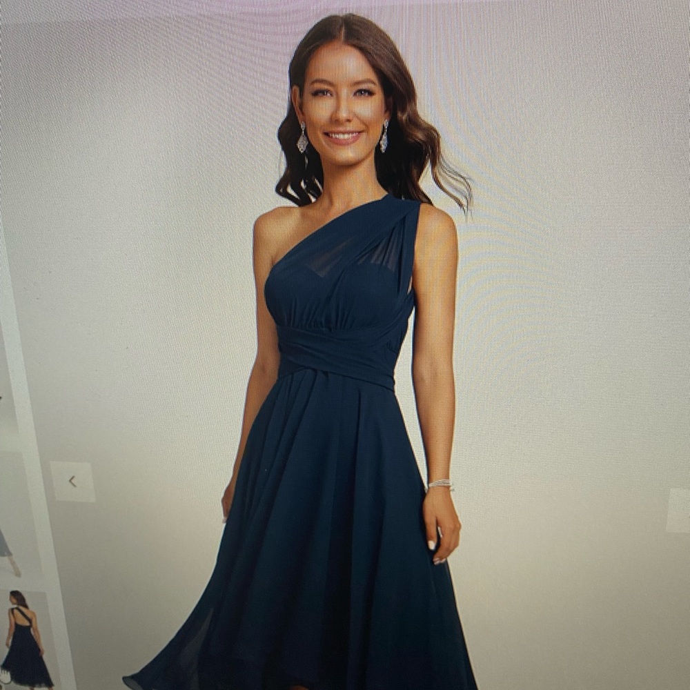 Never worn evening, cocktail, special occasion dress. No alterations.